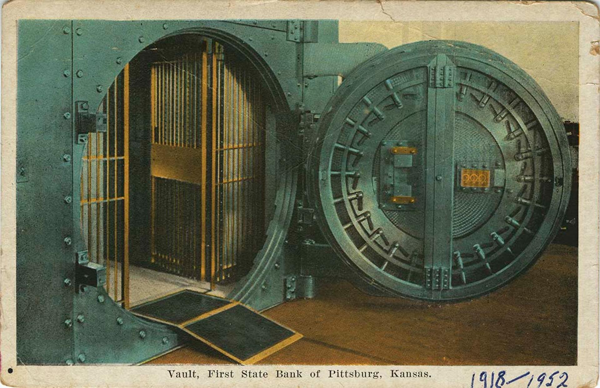 Antique photo of open vault door, with caption below reading: "Vault, First State Bank of Pittsburg, Kansas."